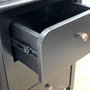 Open drawer view of the Creemore 3 Drawer Bedside in Black with smooth metal runners for easy everyday use