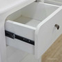 Close-up of the Creemore 3 Drawer Bedside in White with drawer open, showing the internal storage space and smooth metal runners
