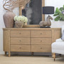 Side-angled shot of the Creemore 6 Drawer Chest, emphasising the soft curves and clean-lined frame.