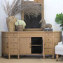 Riverview Sideboard shown with doors ajar to display internal storage space.