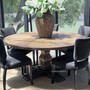 The Danbury Round Table set for dining, embodying relaxed sophistication and British craftsmanship.