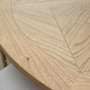 Close perspective of the extension surface, showing organic cedar grain movement.
