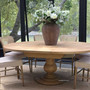 Front perspective of the Sycamore expandable round table, seating up to eight guests.