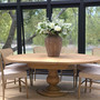Angled view of the extendable Sycamore table in extension, styled for entertaining.