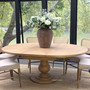 The Sycamore table extended with seating, ideal for Hamptons and classic interiors.