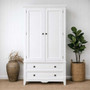 Front view of the Peninsula 2 Drawer Wardrobe in distressed white, showcasing its classic elegance and suitability for Hamptons-style interiors.