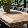 Close-up of the carved apron detail on the Renaissance Oak Parquetry Double Extendable Dining Table.