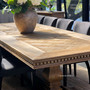 Fully extended Renaissance Oak Parquetry Dining Table set for entertaining.