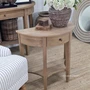 Left angled view of the Luna Side Table showcasing its half-moon silhouette and practical storage drawer.