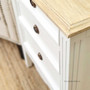 Close-up detail showcasing the minor distressing on the bedside, highlighting its traditional craftsmanship.
