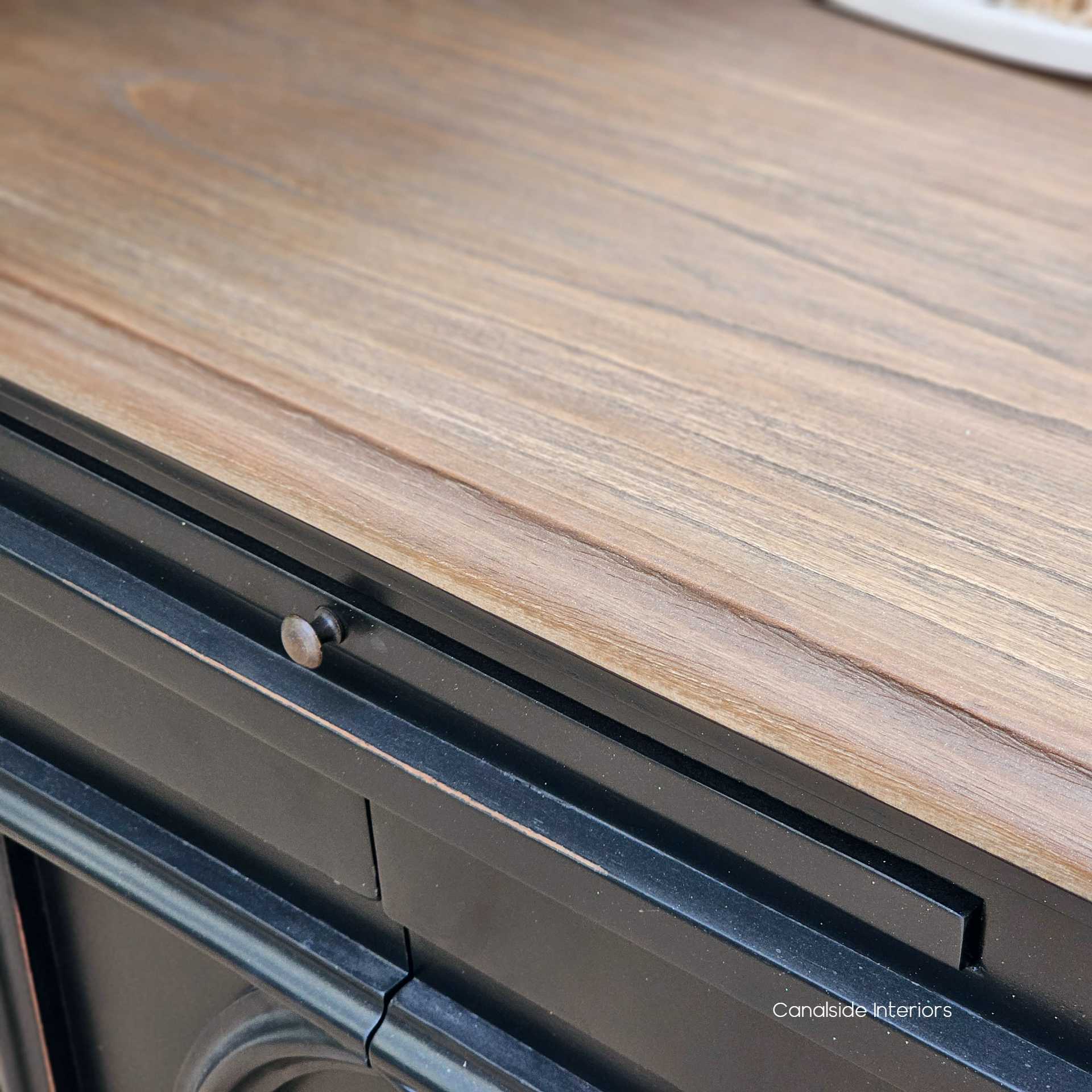 Detailing the seamless joinery, this image shows how the Bastian Sideboard combines traditional design with the sleek, clean lines favored in contemporary storage solutions.