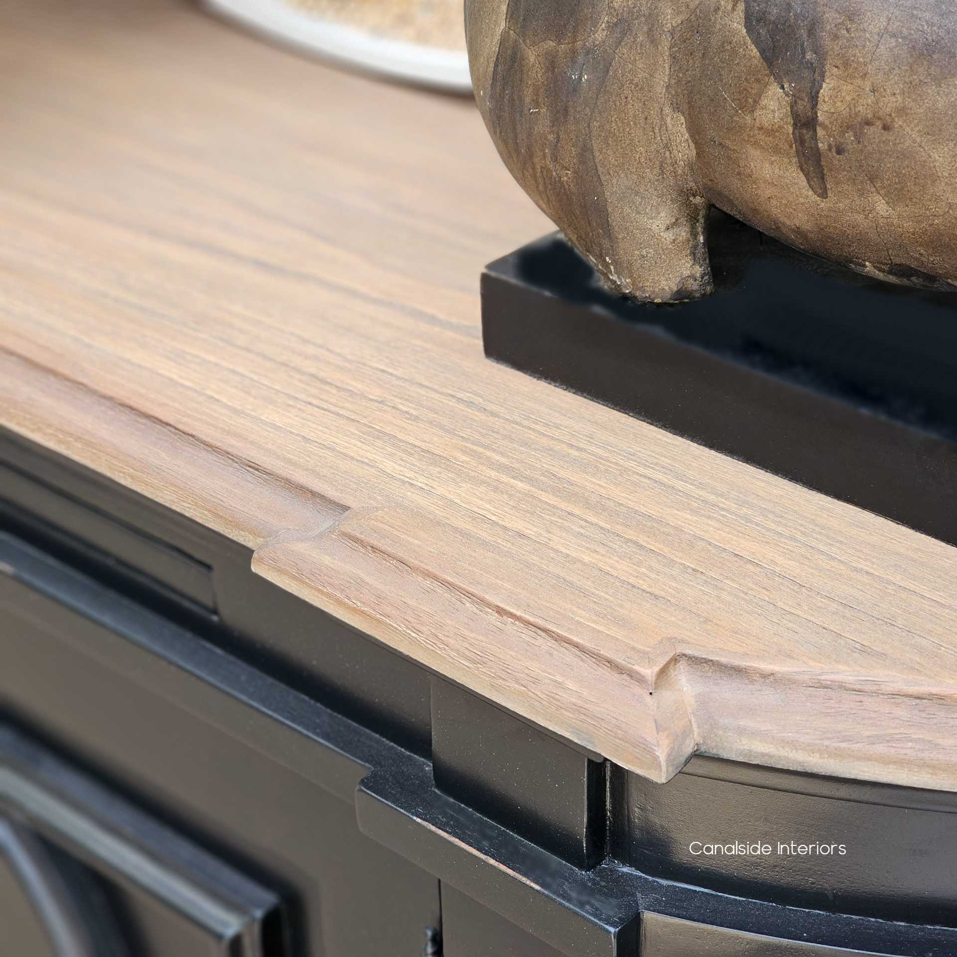 Bastian Small Sideboard Distressed Charcoal Weathered Oak with its smooth weathered oak surface, offers a practical yet stylish surface for decorative vases or picture frames, enhancing any lounge room