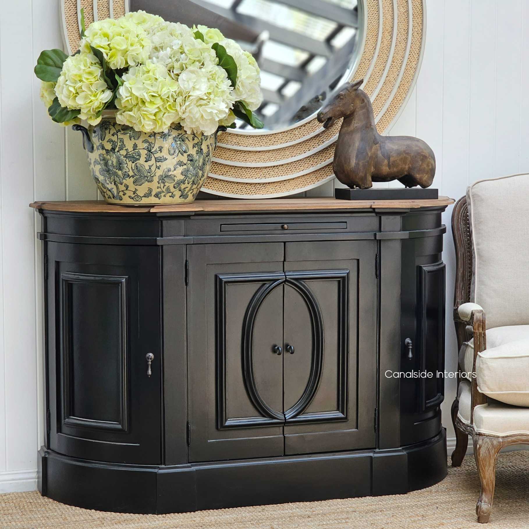 Sideboard displayed in a coastal living room setting, the dark charcoal finish contrasting with bright interiors for a classical statement - Canalside Interiors