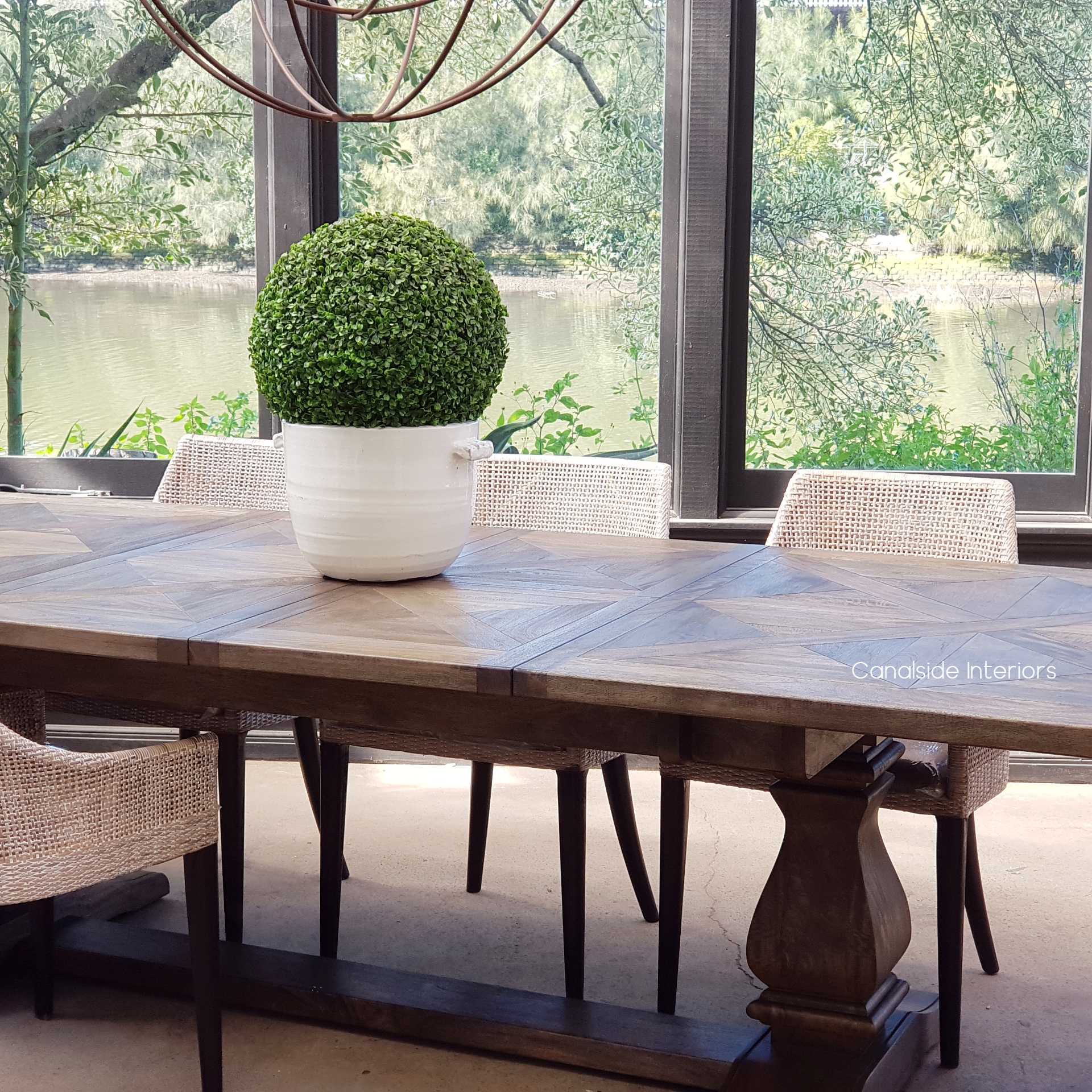 Versatile and modern, the Bridgehampton Extension Table transitions from intimate family dinners to large gatherings, suited for the contemporary library or home office - Canalside Interiors