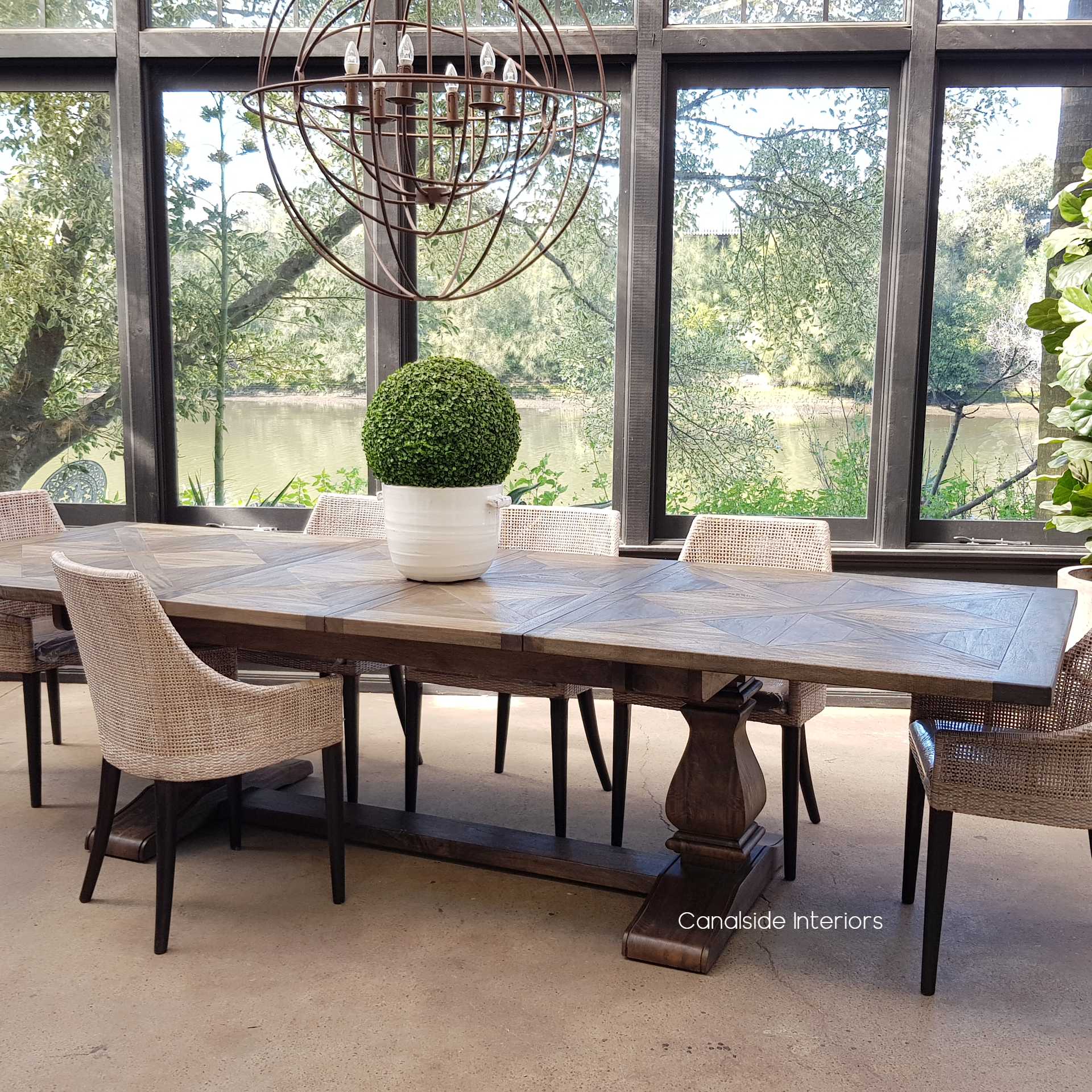 The coastal allure of the Bridgehampton Table, with its classical dark cedar finish, brings Hamptons elegance to your library or home office