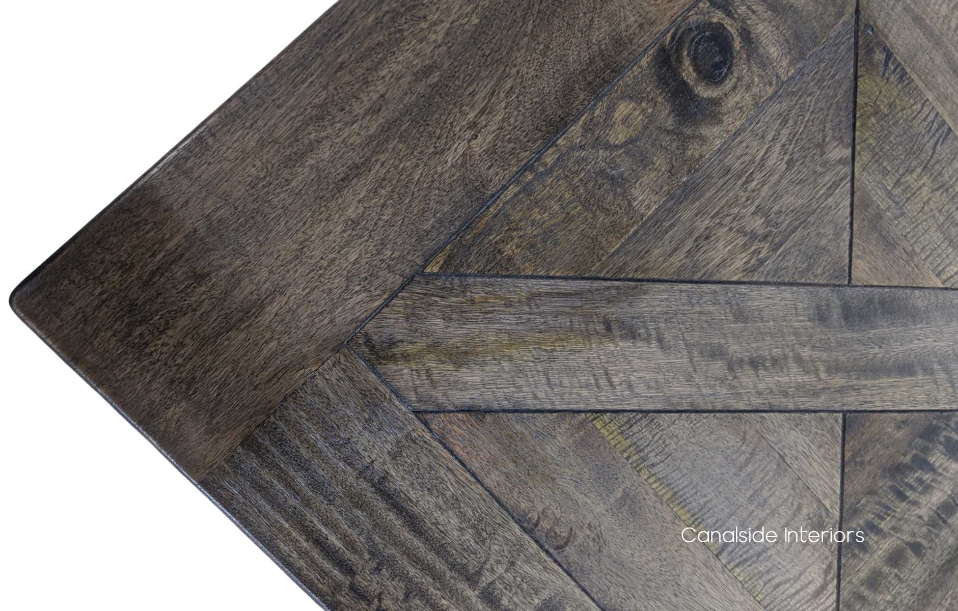 Showcasing the fine art of parquetry, the Bridgehampton Extendable Dining Table offers a sophisticated centerpiece for the modern dining room - Canalside Interiors.