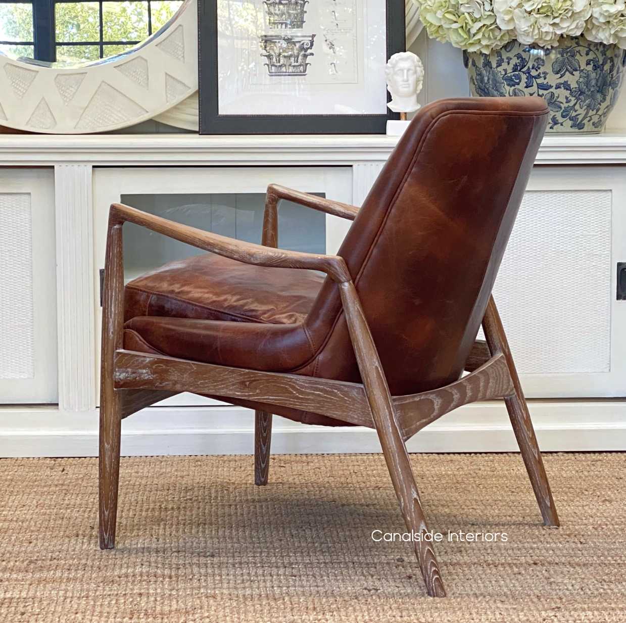 Elevate your home office with the Holt Aged Leather Armchair, blending a modern Danish design with the classical warmth of aged leather - Canalside Interiors