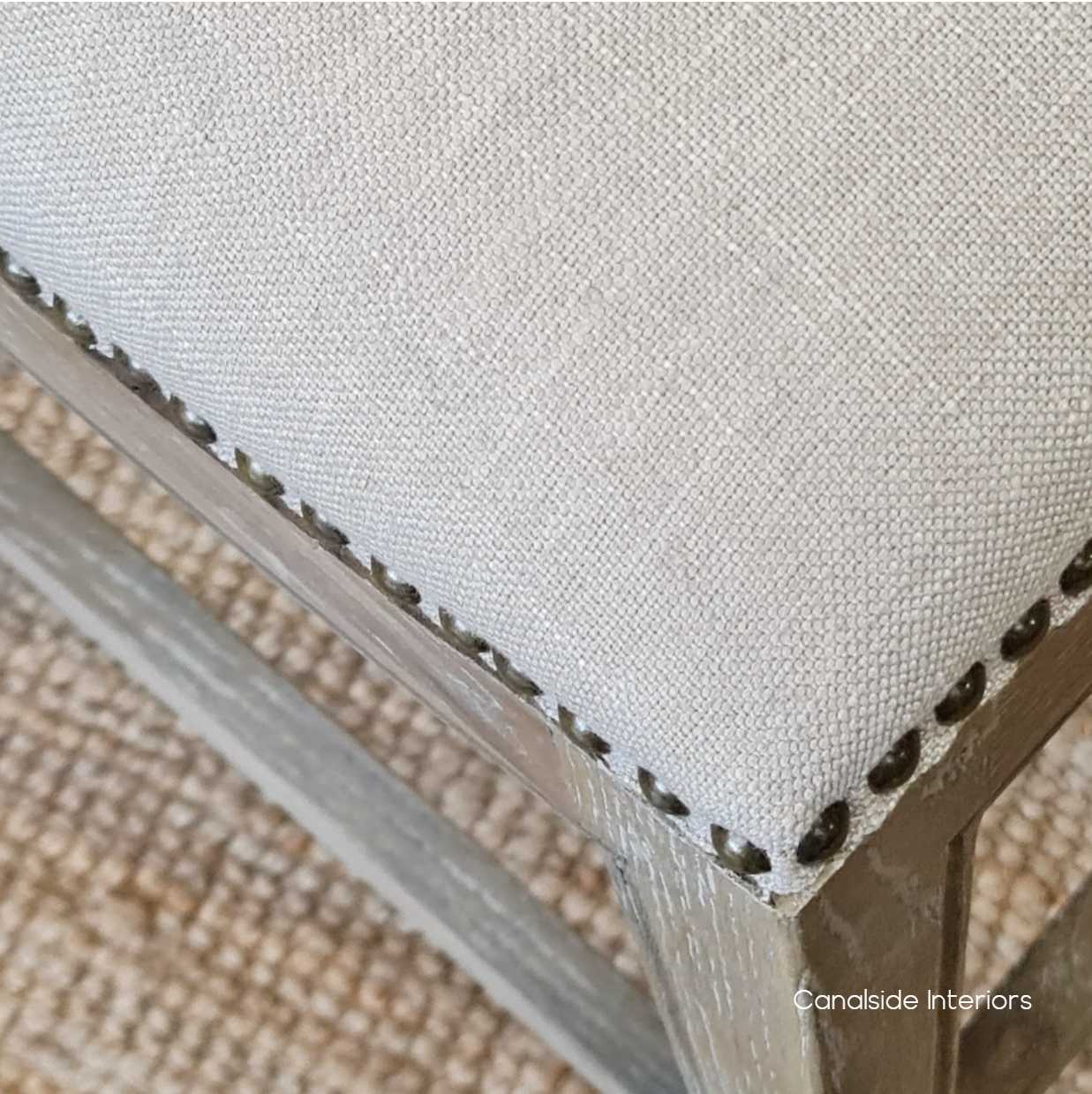 Close-up on the stud detailing of the Mila II Bar Stool, emphasizing the quality craftsmanship and elegant design.