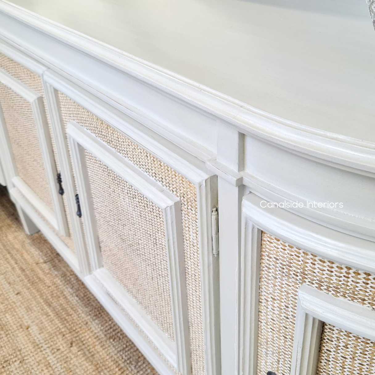 accentuate your living room with the coastal elegance of the Francia Rattan Sideboard in distressed stone, a testament to timeless style by Canalside Interiors