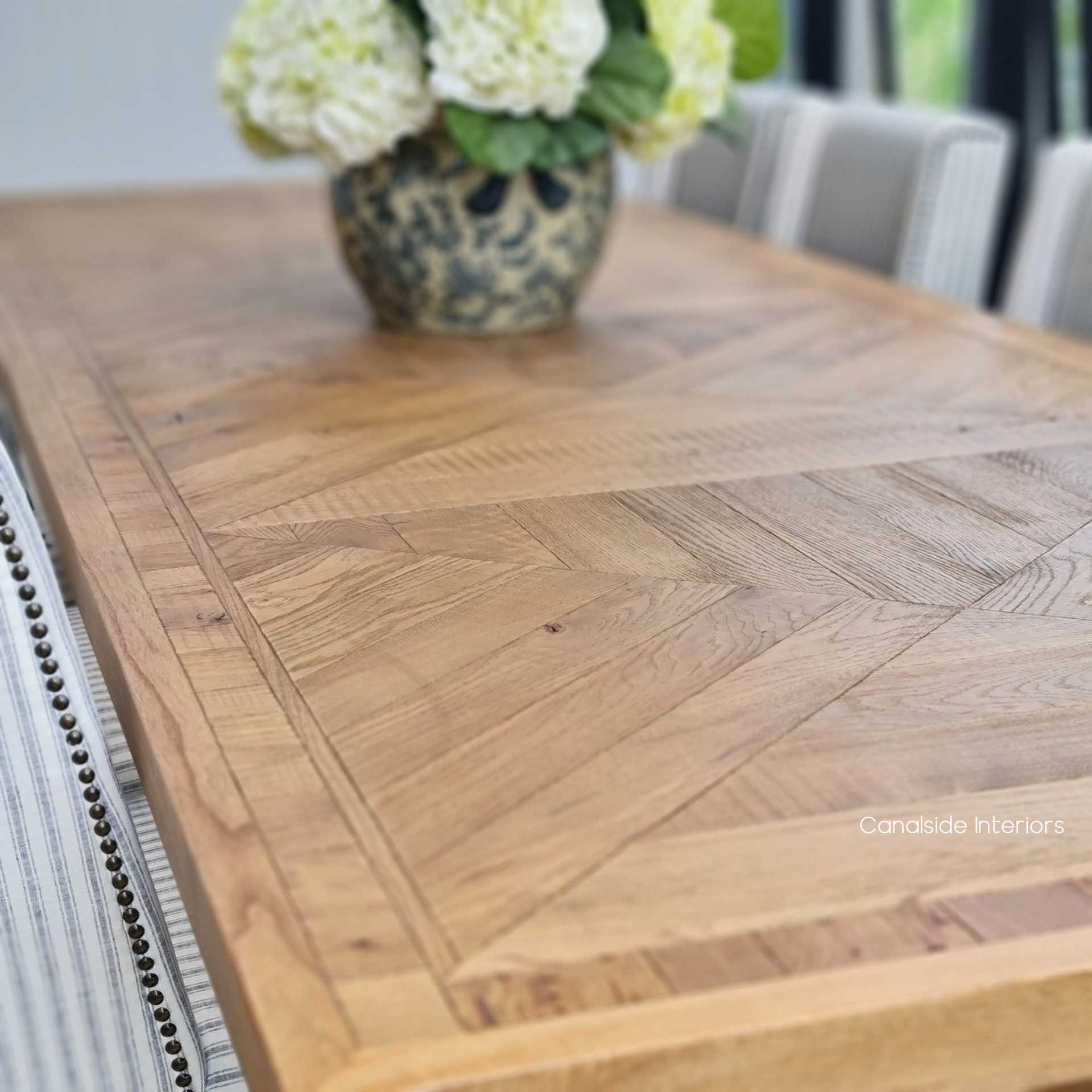 UK-designed Danbury Oak Table with a pedestal base, adding timeless elegance to your lounge room or library