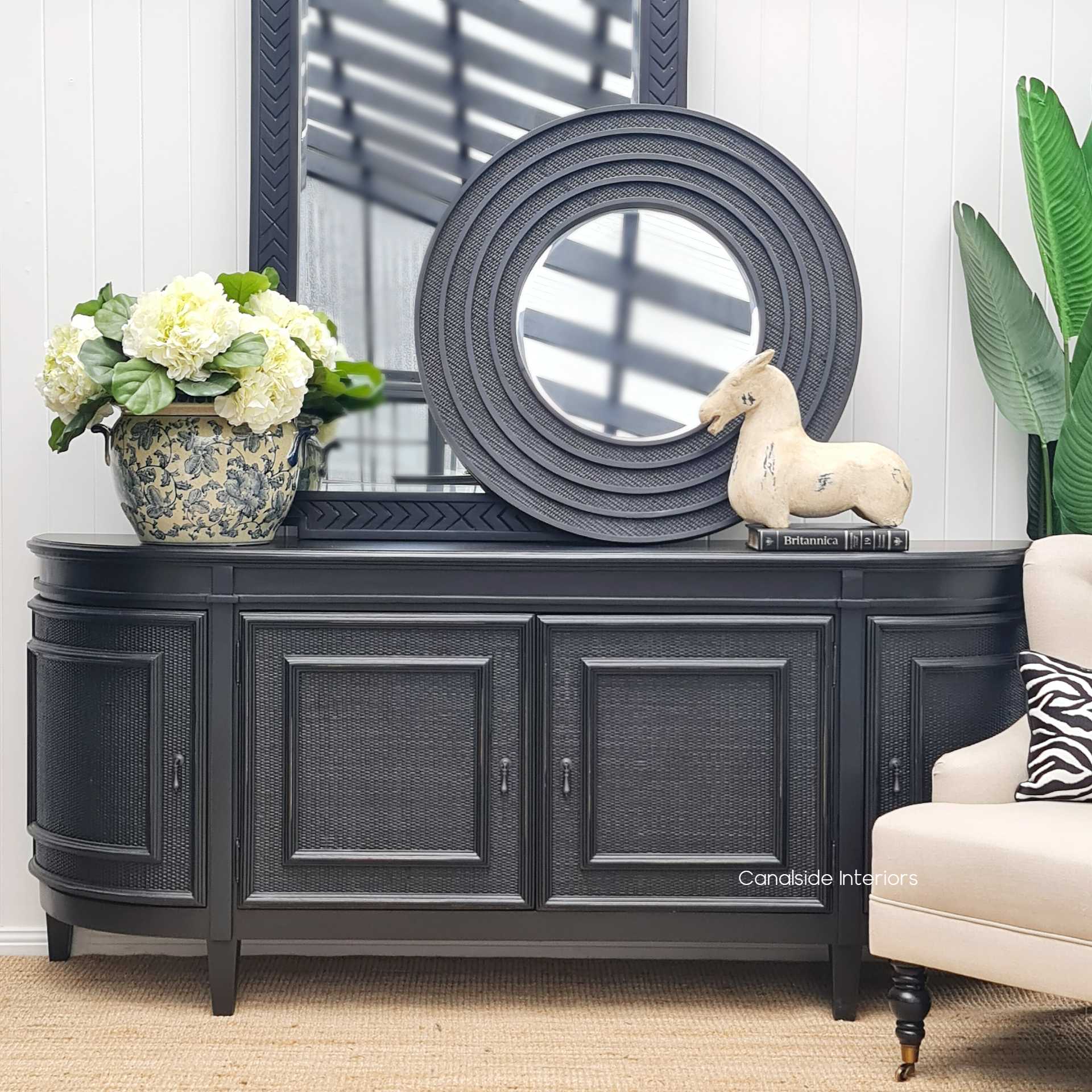 Infuse modern practicality and classic elegance into your home office with the Francia Rattan Sideboard from Canalside Interiors, featuring a distressed black/charcoal hue