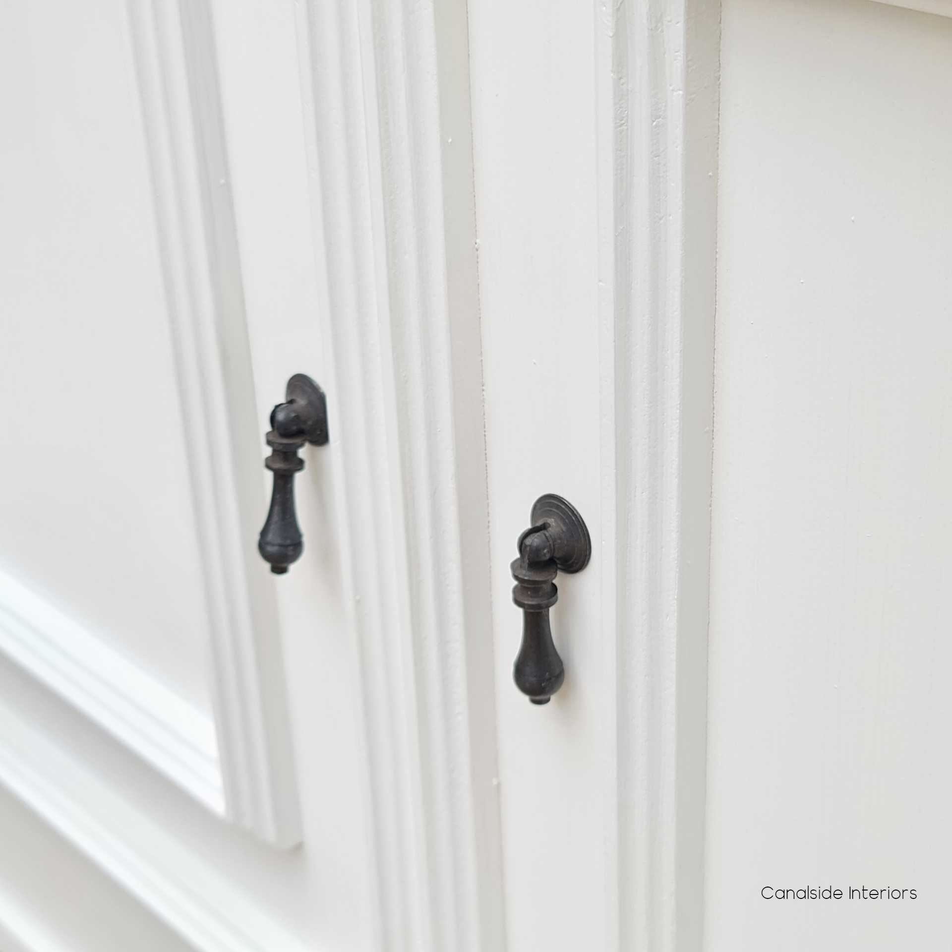 Close-up of the Francia Cupboard doors, showcasing the fine workmanship in line with Canalside Interiors' classical design ethos
