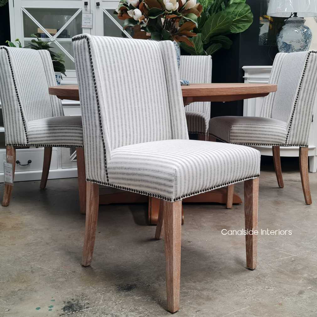 Leclerc Dining Chair as part of a chic and stylish dining room ensemble, enhancing the room's overall decor.