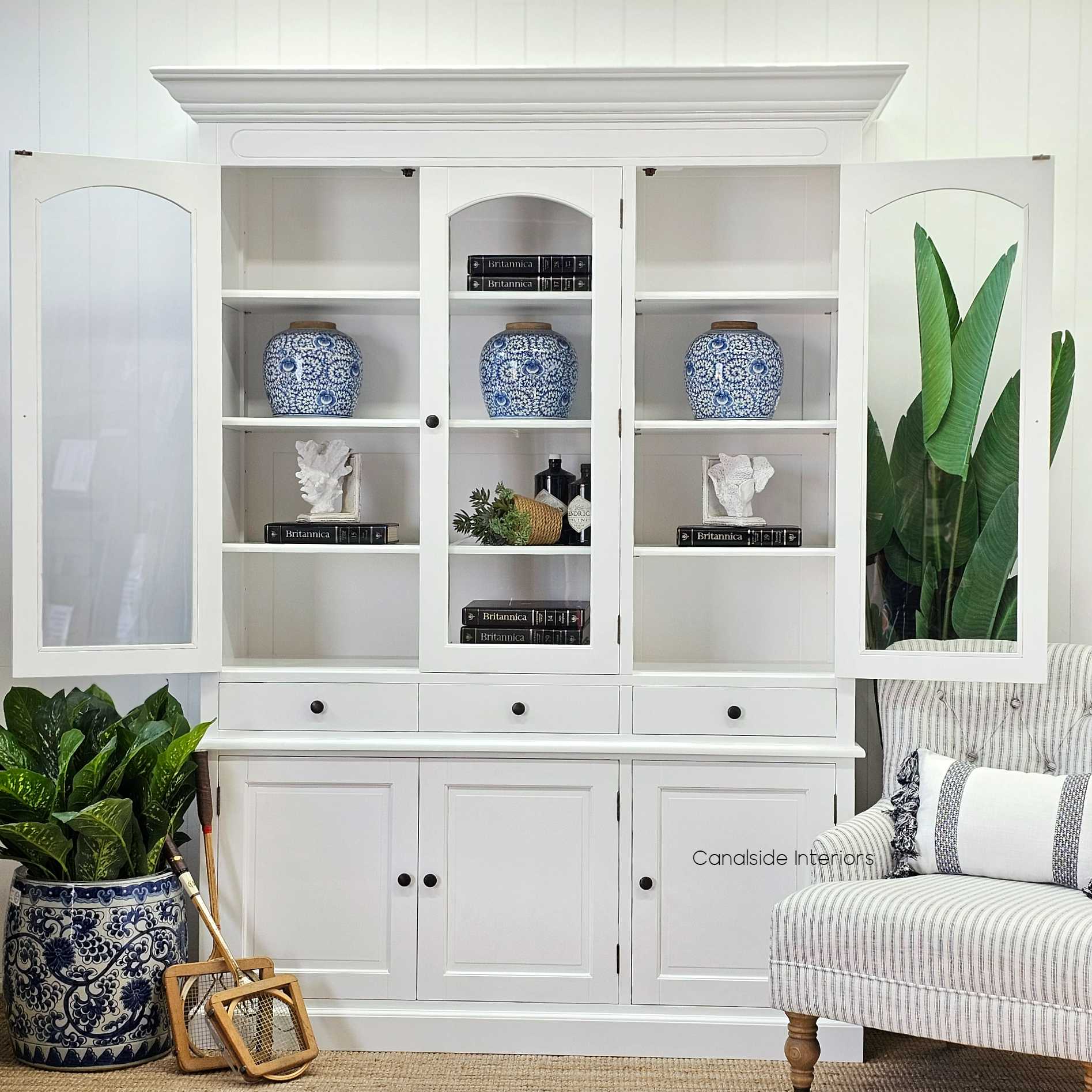 The spacious top of the Key Largo Unit, ideal for decorative vignettes, combines storage and style for a modern bedroom