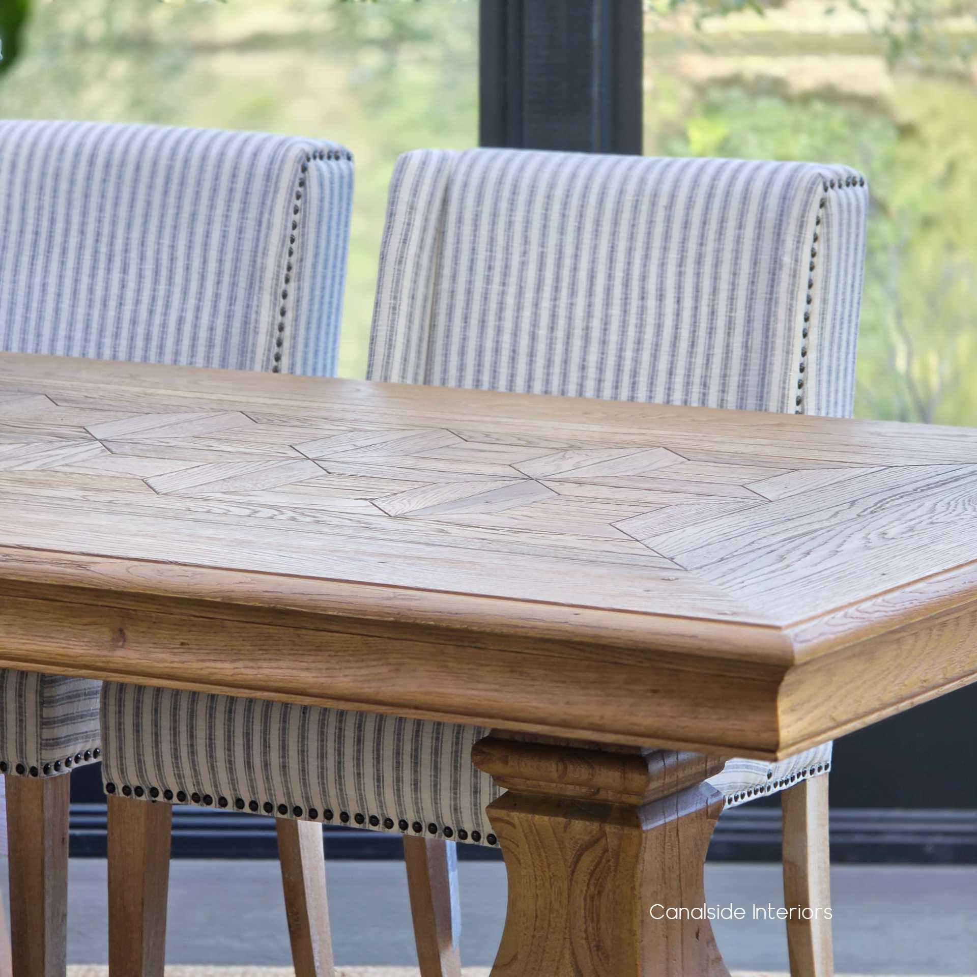 Chesterton dining table styled with Hamptons-inspired décor for a coastal look.