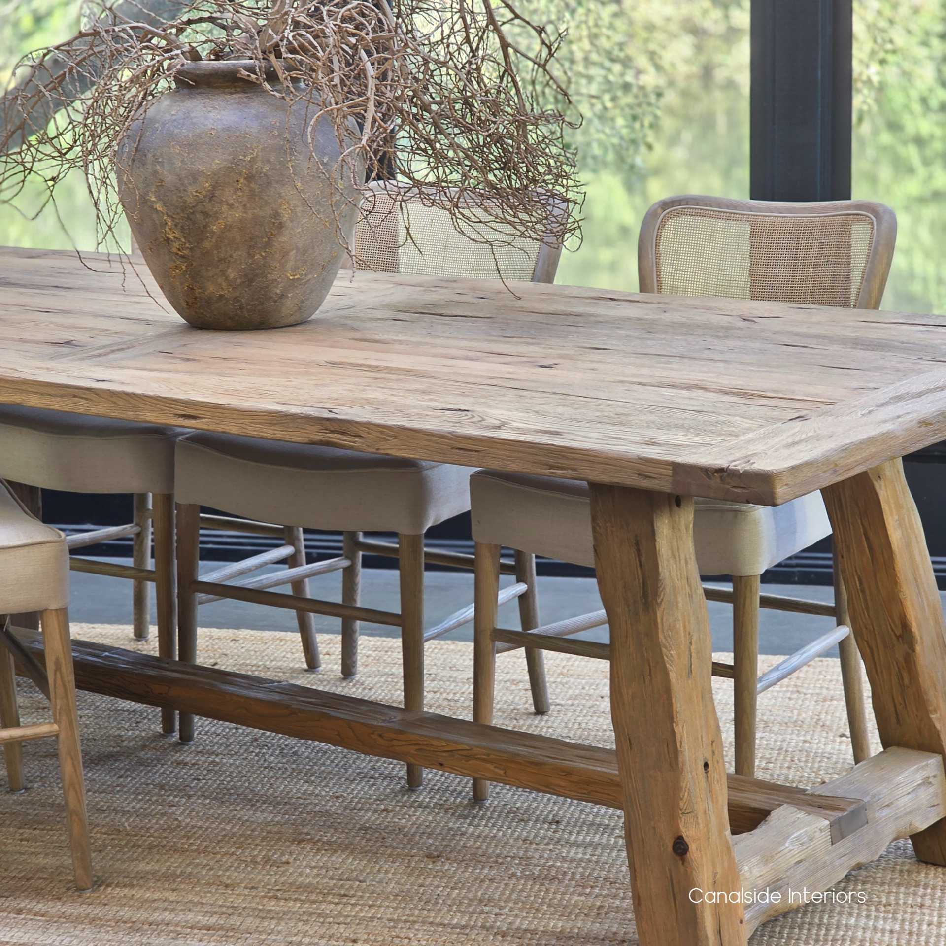 Focused shot of the table’s joint lines, showcasing reclaimed wood variations.