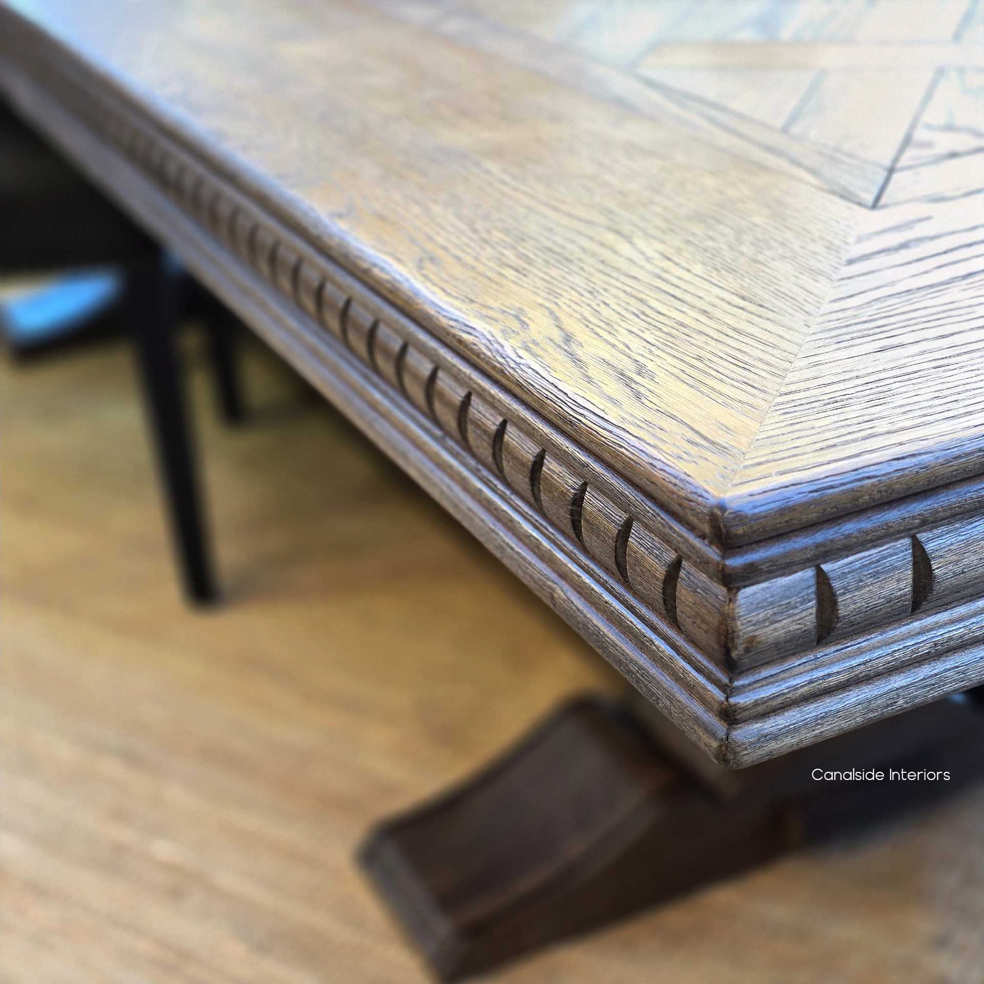 Close-up on the table's intricate border inlays, highlighting the unmatched craftsmanship and attention to detail.