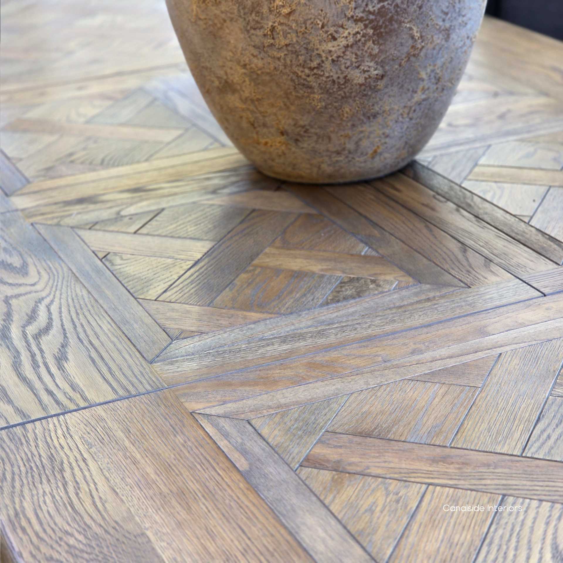 Detail shot of smooth parquetry joins in Cigar oak tabletop.