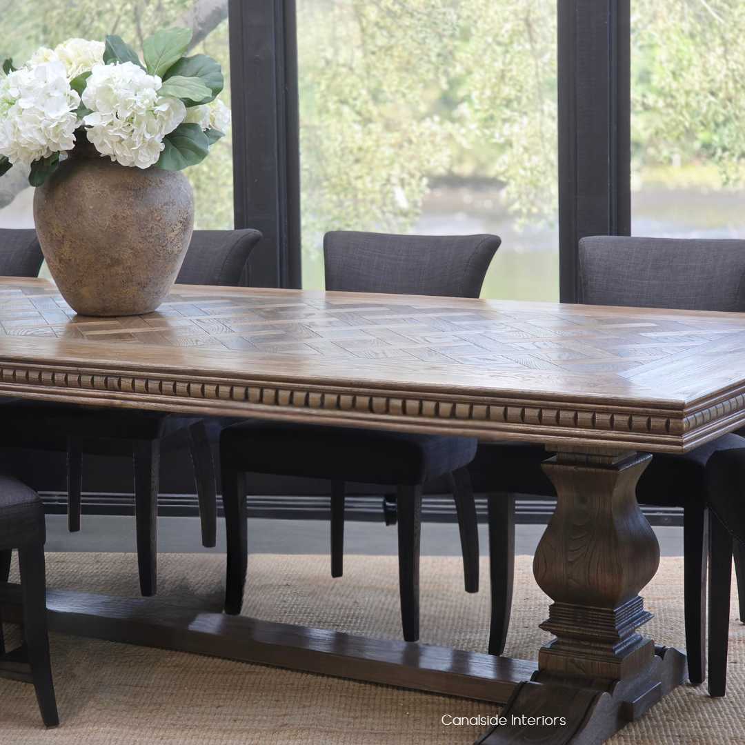 Berenson Oak Parquetry 245cm Dining Table in Cigar finish styled in a formal dining room.