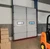LED-ARIES-ME123C-K10 Aries LED mounting channel installed on a commercial sectional door in a warehouse