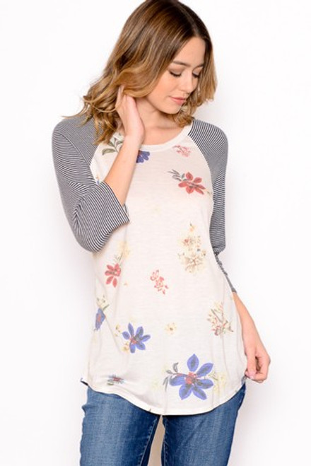 Floral printed maternity top with striped 3/4 length sleeves, in relaxed fit, with round neck, and side slits.