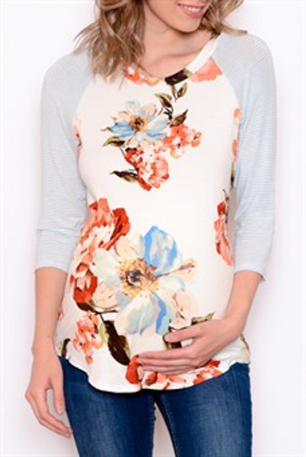 Floral print, maternity tunic top in a relaxed fit with a round neck, striped 3/4 length raglan sleeves, and hi-low hem.


Origin : USA