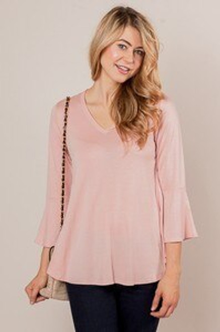 Solid dusty pink knit maternity top with 3/4 length bell sleeves, v-neckline, and rounded hem.


Origin : USA