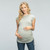 A striped maternity top featuring cap sleeves, high neck line and tied ruched sides.