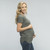 Solid hued, basic maternity top featuring ruched sides, short sleeves and a v-neckline. Casual and comfortable. Kick back and relax or head out in this versatile maternity tee.The side-ruching on this top allows this top to fit your growing bump all 40 weeks and beyond! Available in a variety of colors.