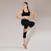 Girl wearing Energetiks Tech Fit stretch canvas pull on jazz boot in Tan, side view