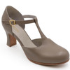 Capezio closed toe T-strap leather character shoes for adults with cushioned suede lining and non-slip heel in tan