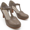 Capezio closed toe T-strap leather character shoes for adults with cushioned suede lining and non-slip heel in tan