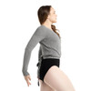Woman wearing Capezio ballet knit wrap sweater top in grey, side view