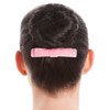 Energetiks Velvet Hair Bow with Comb for Dance & Performance in Ballet Pink, in a dancer's bun