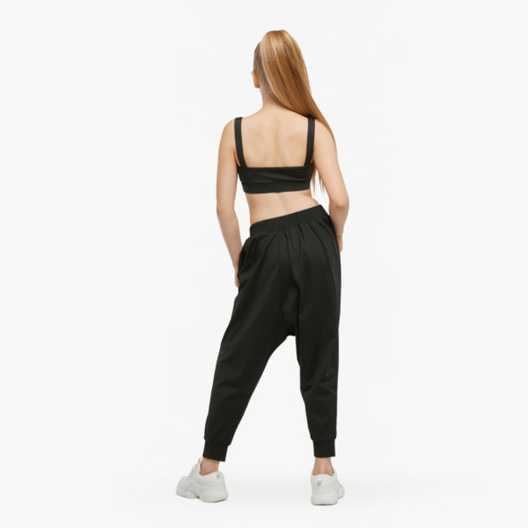  Girl wearing Studio 7 Dancewear Unisex Black Harem Pants, back view