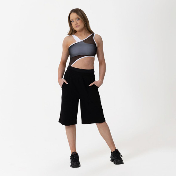 Studio 7 Dancewear Kael Track Unisex Shorts Children's Sizes in Black, worn by a dancer