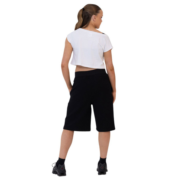Girl wearing Studio 7 Dancewear cropped studio tee in white, back view