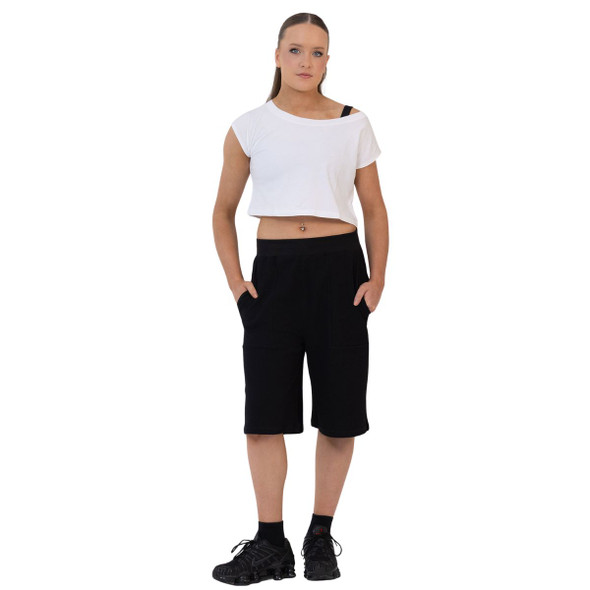 Girl wearing Studio 7 Dancewear cropped studio tee in white, front view