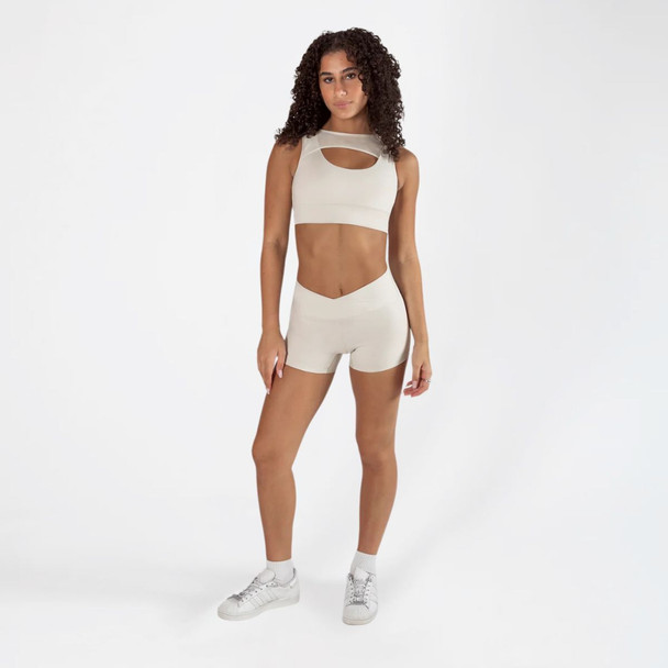 Energetiks Delta Double-Fronted Dance Crop Top Adult Sizes in Ivory Sands, dancer front view