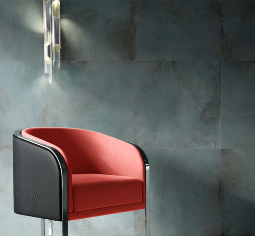 Oxide Mint verde green blue wall tiles used in a sitting room with a red chair